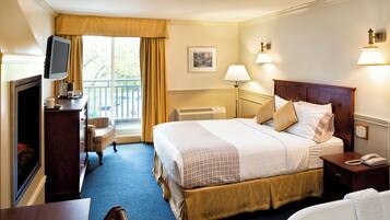 Superior Room, 1 King Bed, Jetted Tub | 1 bedroom, desk, laptop workspace, blackout drapes