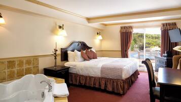 Desk, laptop workspace, blackout drapes, iron/ironing board