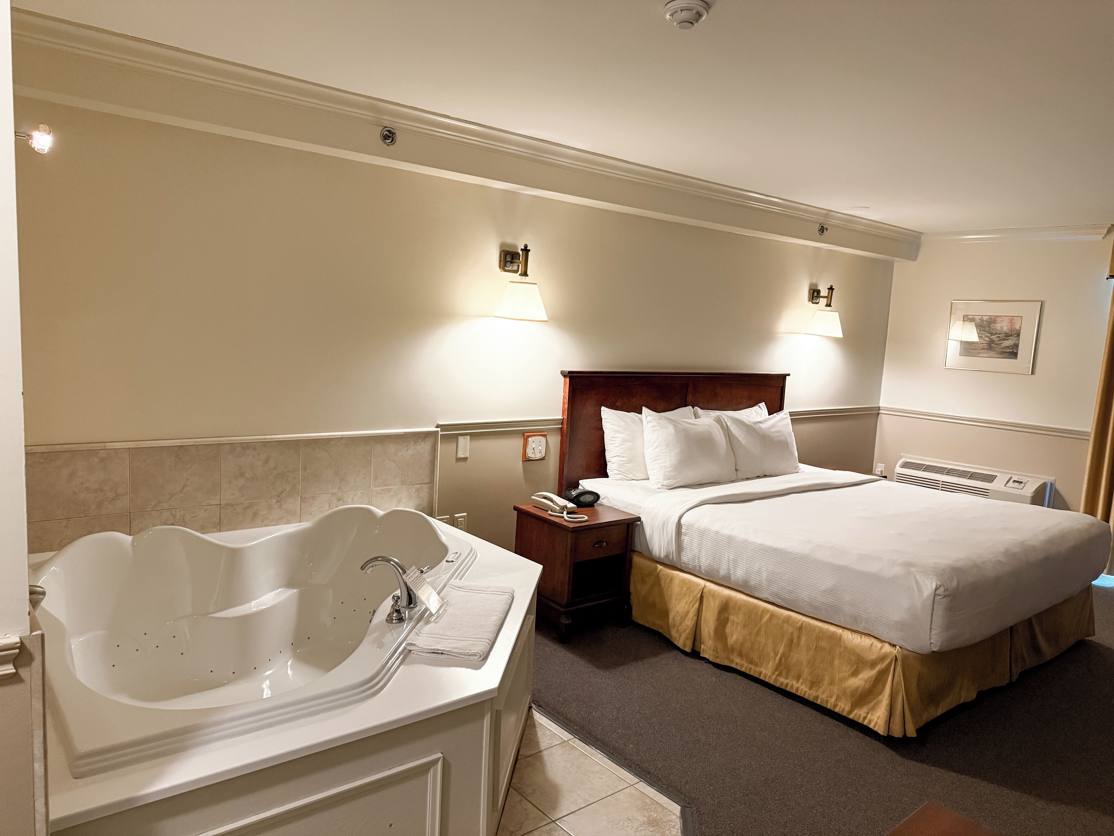 superior room, 1 king bed, jetted tub | desk, laptop workspace, blackout curtains, iron/ironing board