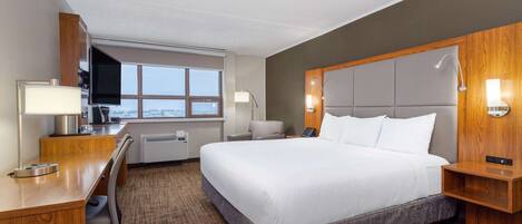 Hypo-allergenic bedding, desk, laptop workspace, blackout curtains