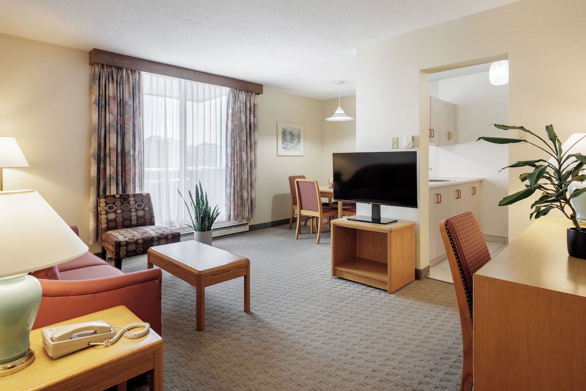 Standard Suite, 1 Bedroom | Living area | 52-inch LED TV with digital channels