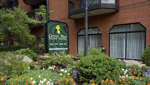 A hotel sign with a key symbol, indicating a key feature of the property. - Cartier Place Suite Hotel (Ottawa)