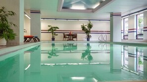 Indoor pool, open 9:00 AM to 10:00 PM, pool loungers