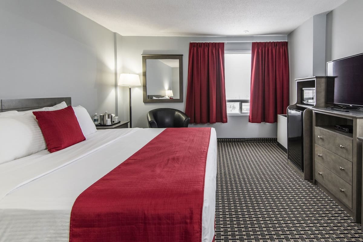 Pillow-top beds, desk, blackout curtains, iron/ironing board
