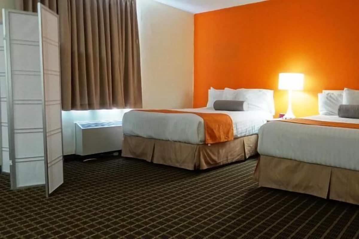 Laptop workspace, blackout drapes, iron/ironing board