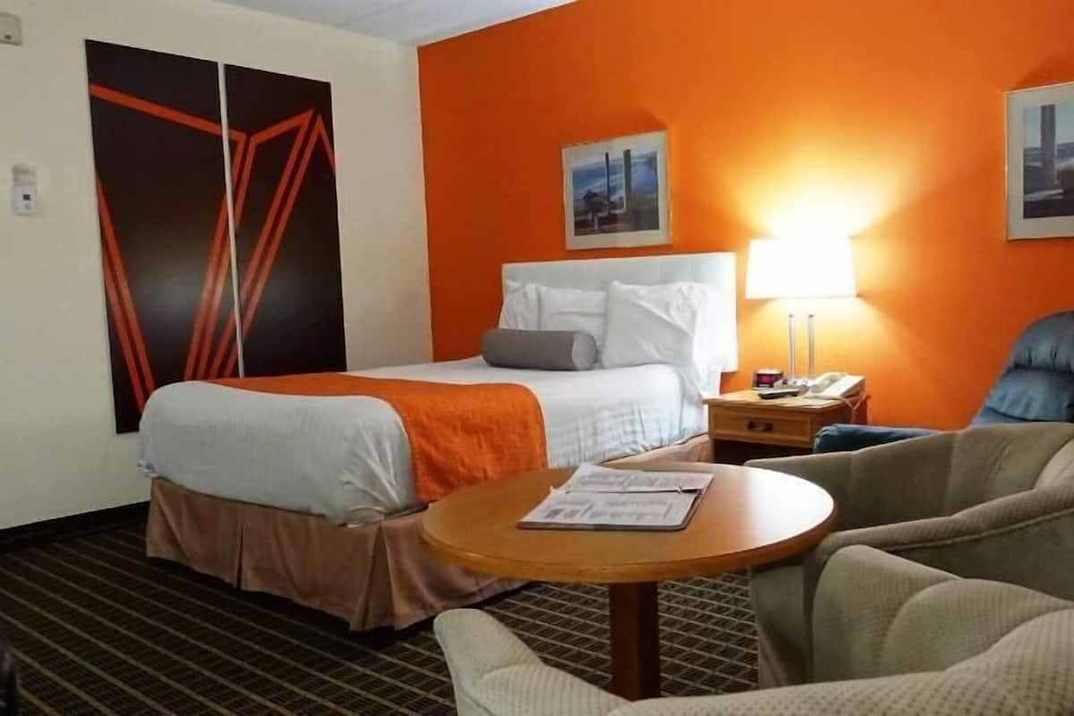 Laptop workspace, blackout drapes, iron/ironing board