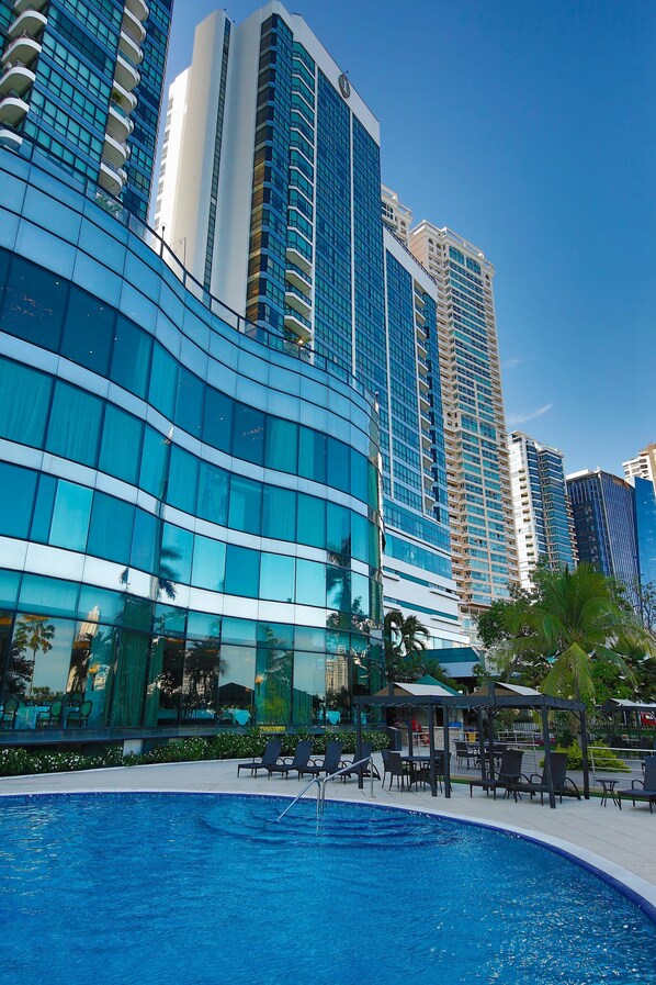 Outdoor pool, pool umbrellas, pool loungers