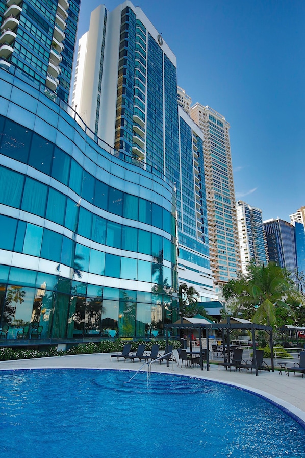 Outdoor pool, pool umbrellas, pool loungers