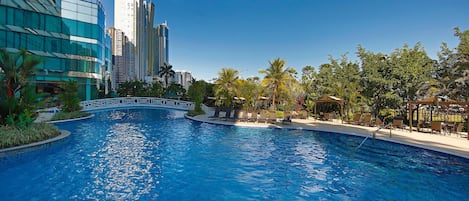 Outdoor pool, pool umbrellas, sun loungers