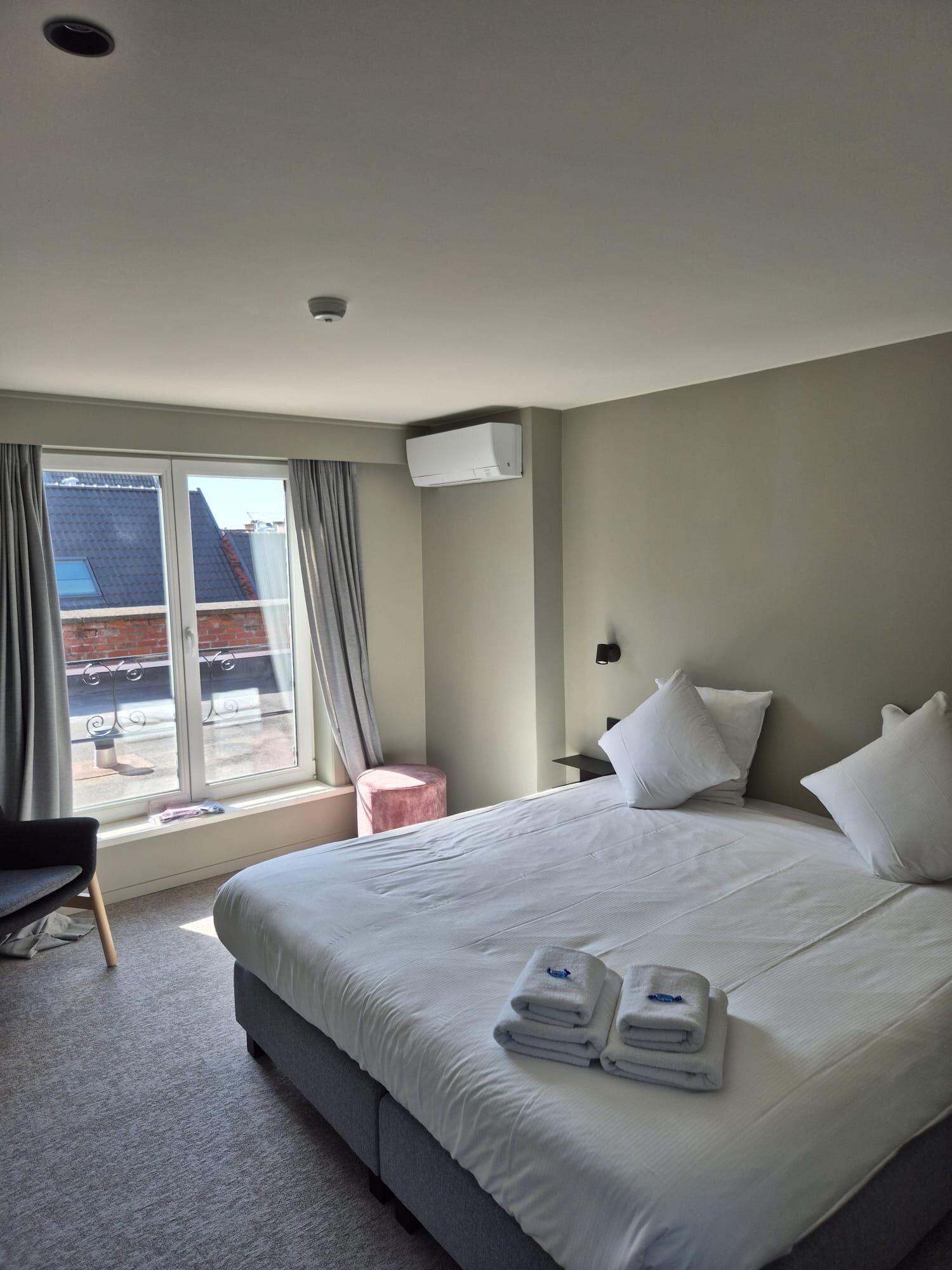quad suite | premium bedding, desk, blackout curtains, free wifi