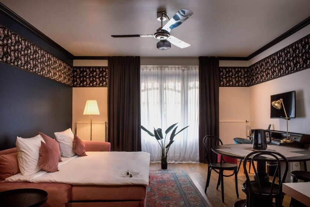 family room | in-room safe, desk, iron/ironing board, free cots/infant beds