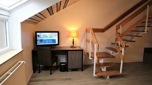 Family Duplex, 2 Bedrooms | In-room safe, desk, blackout drapes, iron/ironing board