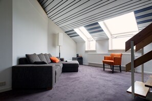 Family Duplex, 2 Bedrooms | In-room safe, desk, blackout drapes, iron/ironing board