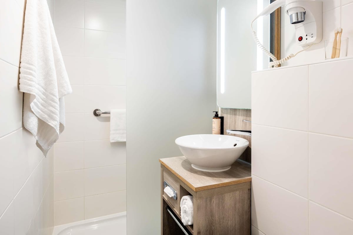 In-room safe, desk, blackout curtains, iron/ironing board