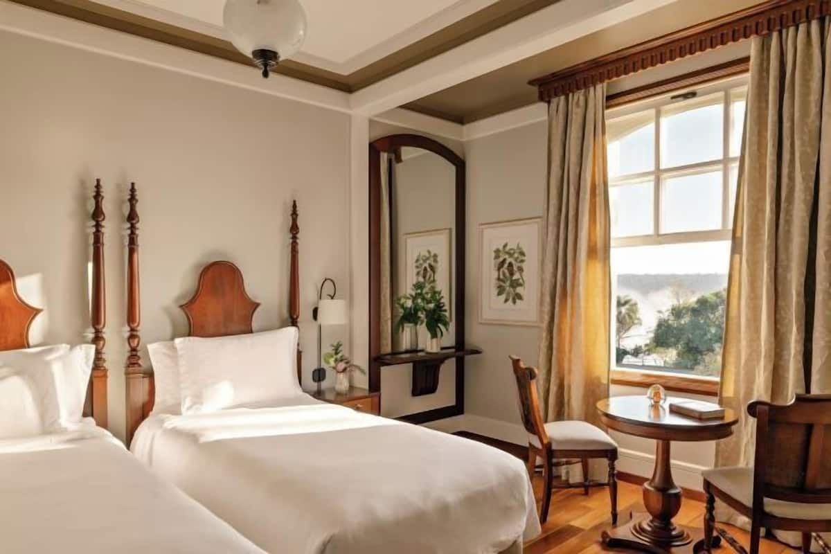 Hypo-allergenic bedding, free minibar, in-room safe, blackout curtains