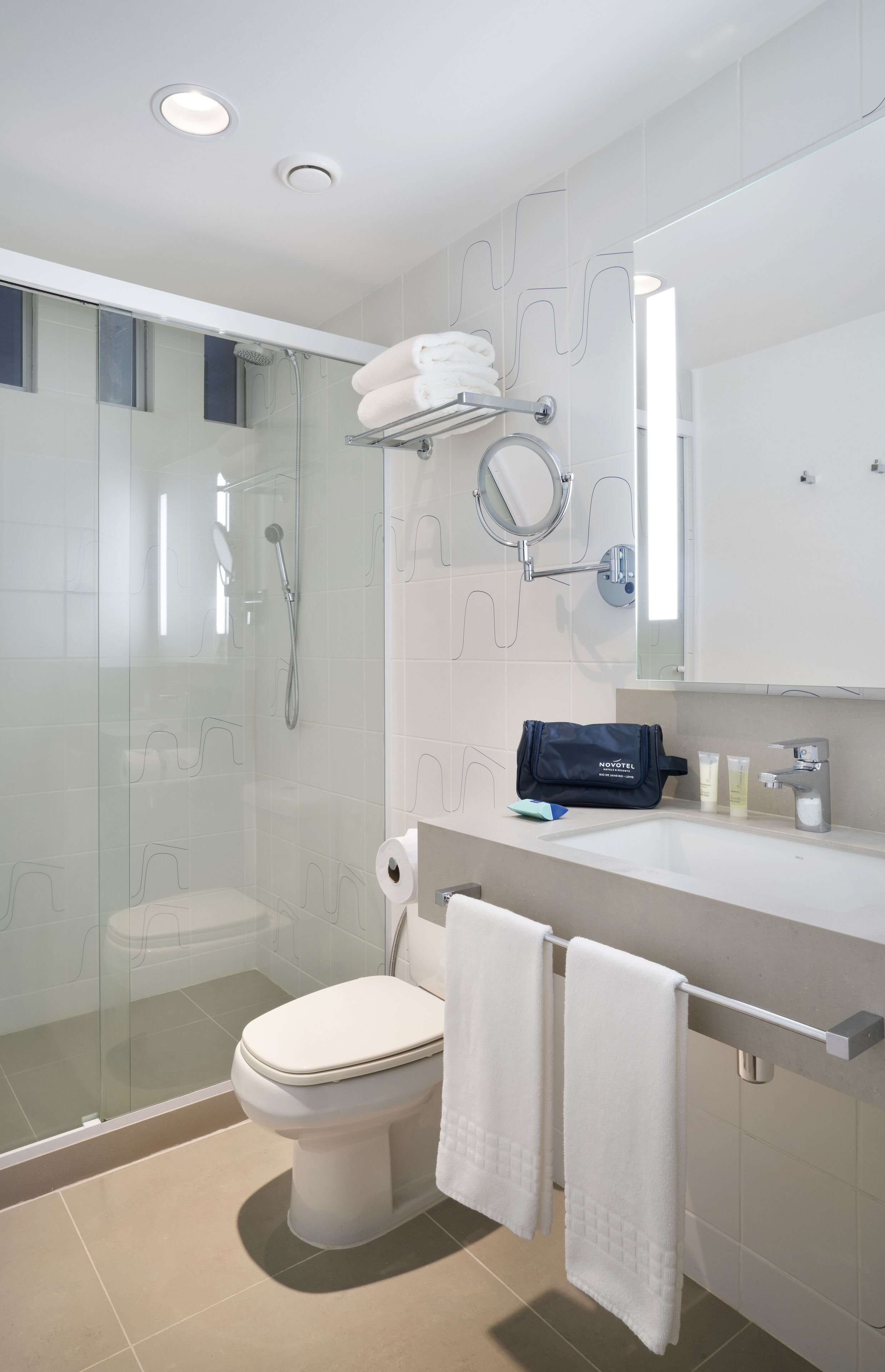 shower, eco-friendly toiletries, hair dryer, towels