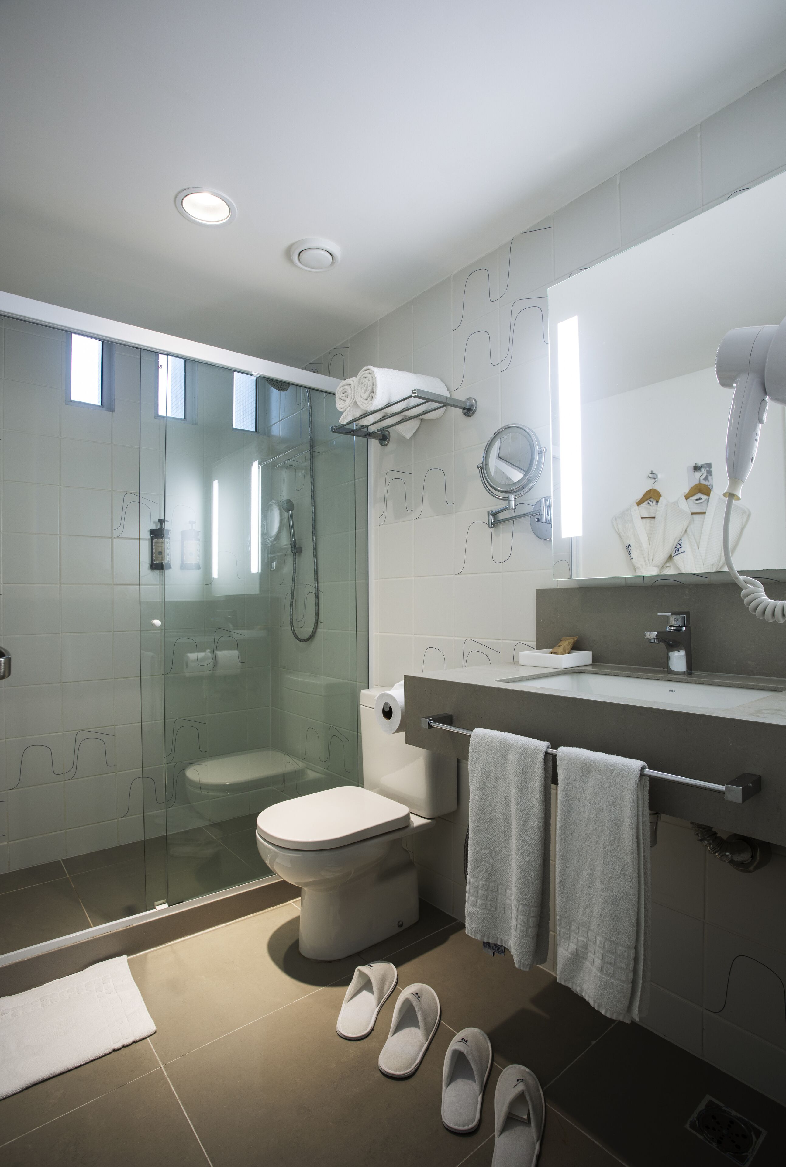 shower, eco-friendly toiletries, hair dryer, towels