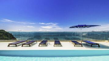 Outdoor pool, sun loungers