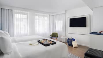 Quarto superior, 2 camas de solteiro | 1 quarto, frigobar, cofres nos quartos, espaço de trabalho para notebook