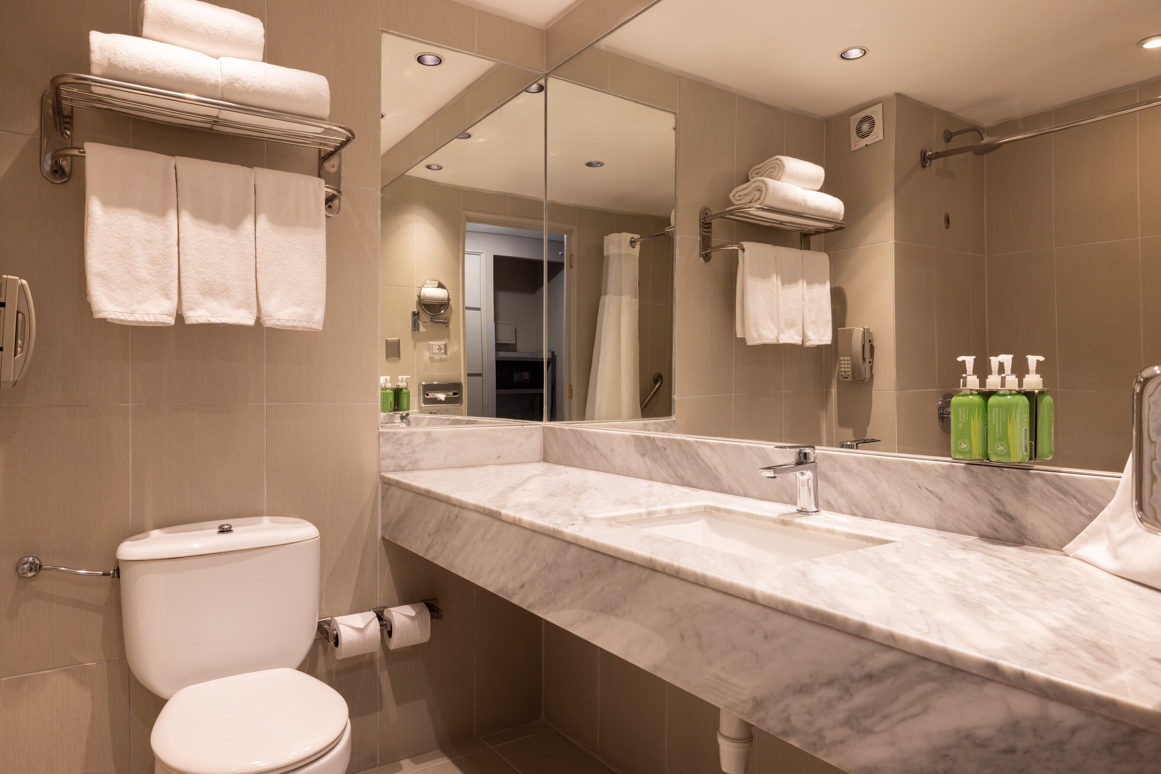 bathtub, free toiletries, hair dryer, towels