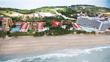 On the beach, beach cabanas, beach massages, beach bar
