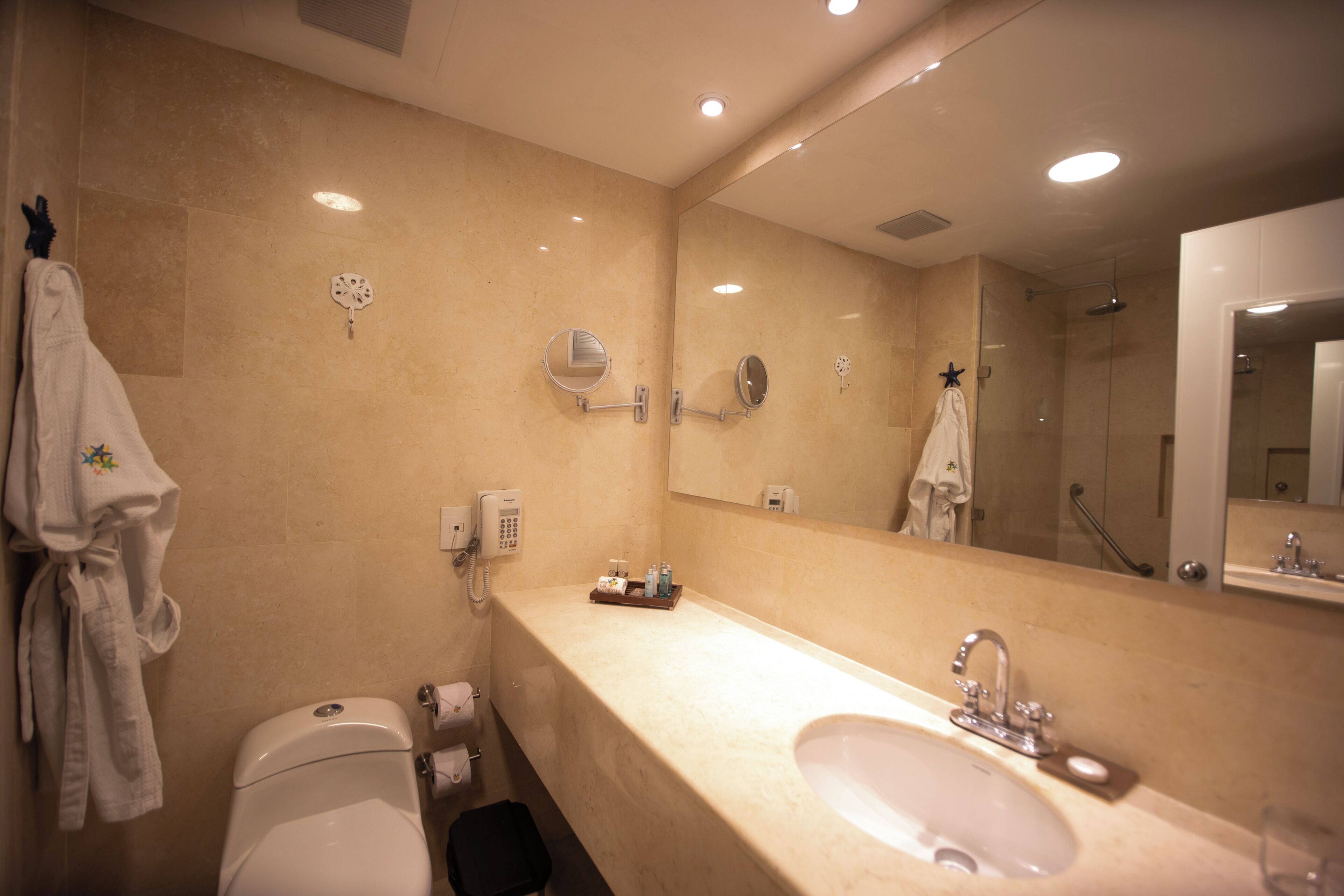 superior room | bathroom | shower, designer toiletries, hair dryer, bathrobes