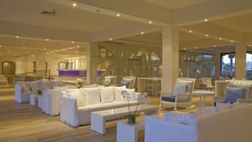2 bars/lounges, poolside bar, beach bar