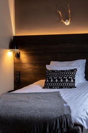 Desk, blackout curtains, free cots/infant beds, free WiFi