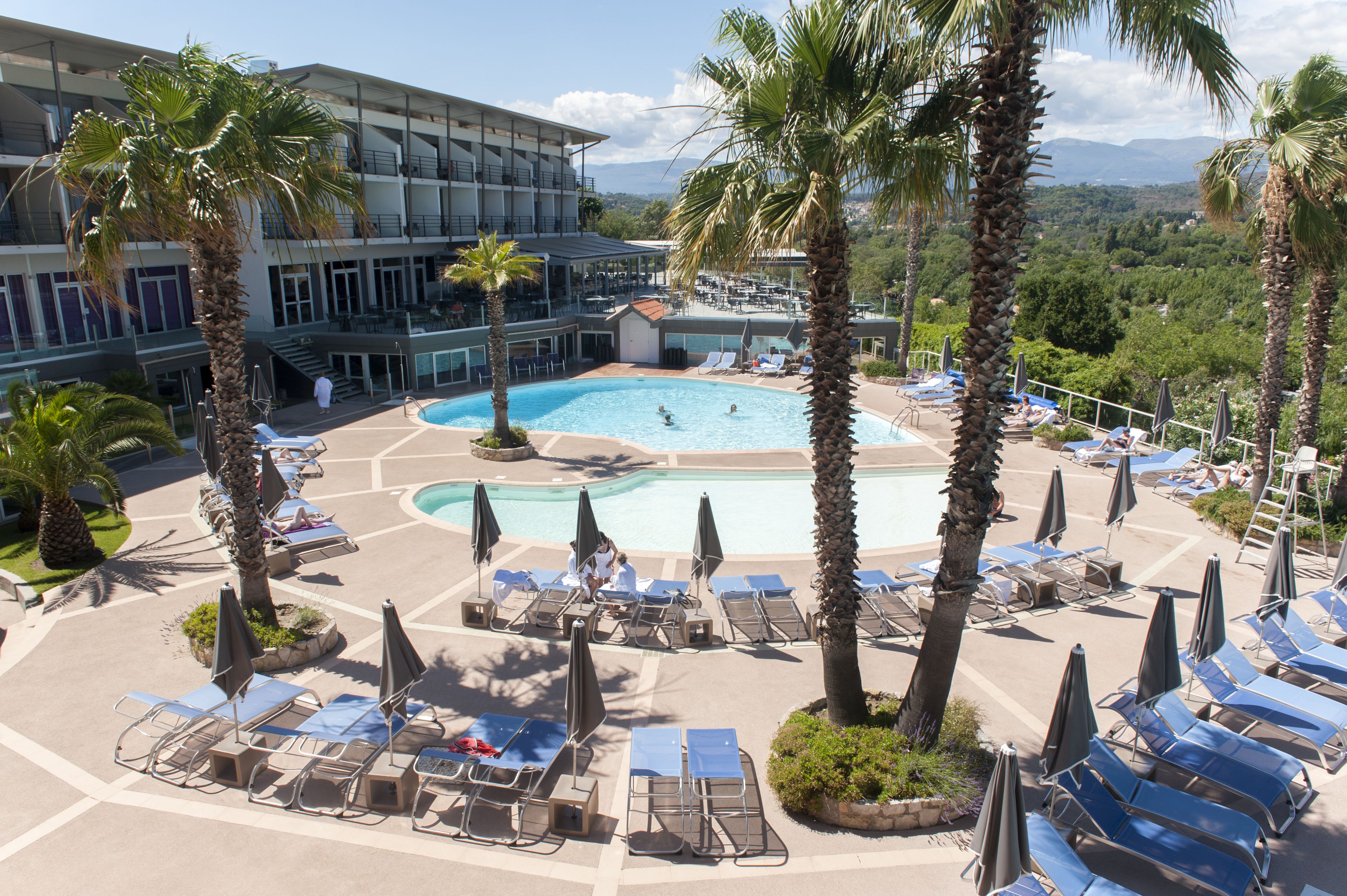 indoor pool, 2 outdoor pools, open 9 am to 7:30 pm, pool umbrellas