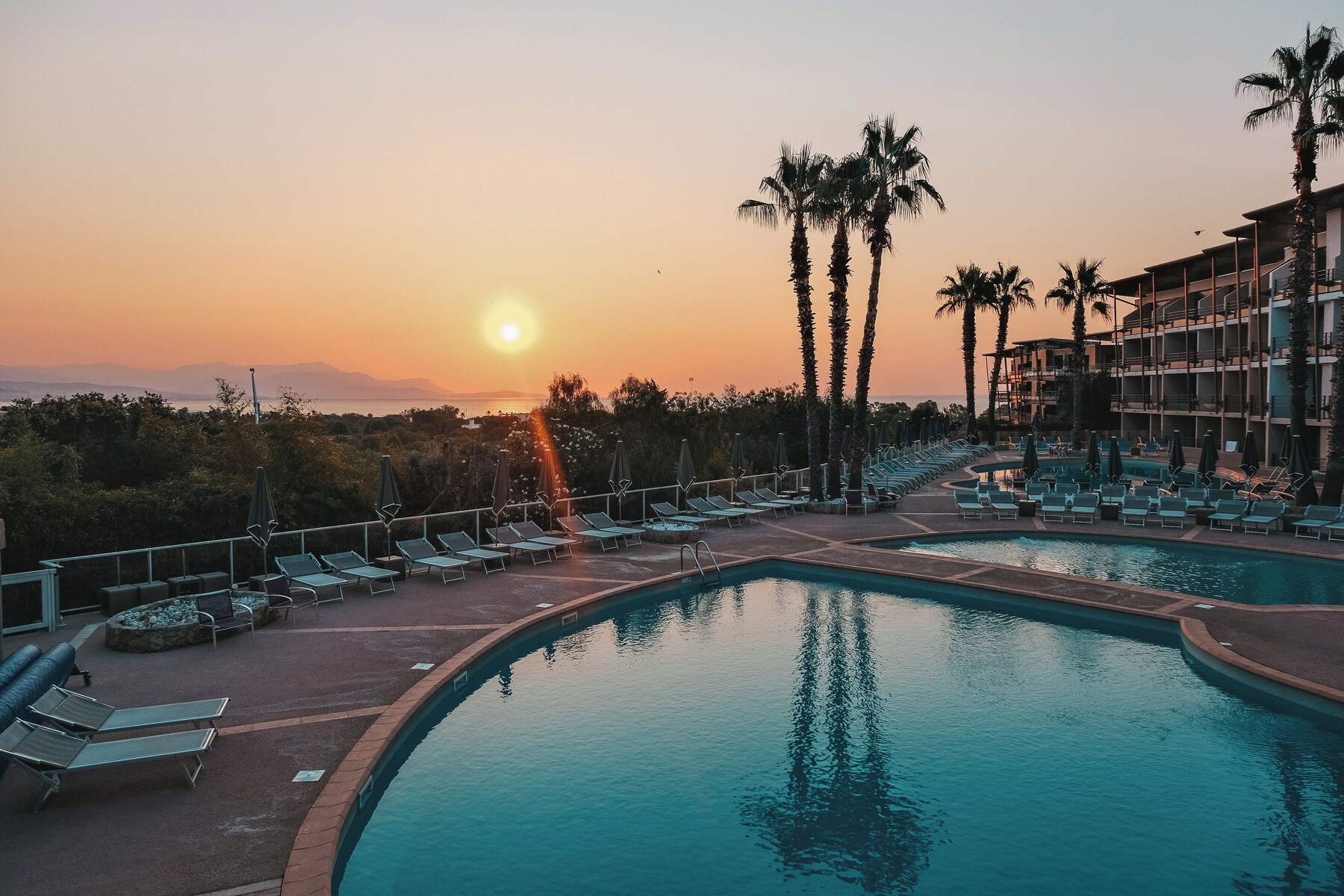 Indoor pool, 2 outdoor pools, open 9 AM to 7:30 PM, pool umbrellas