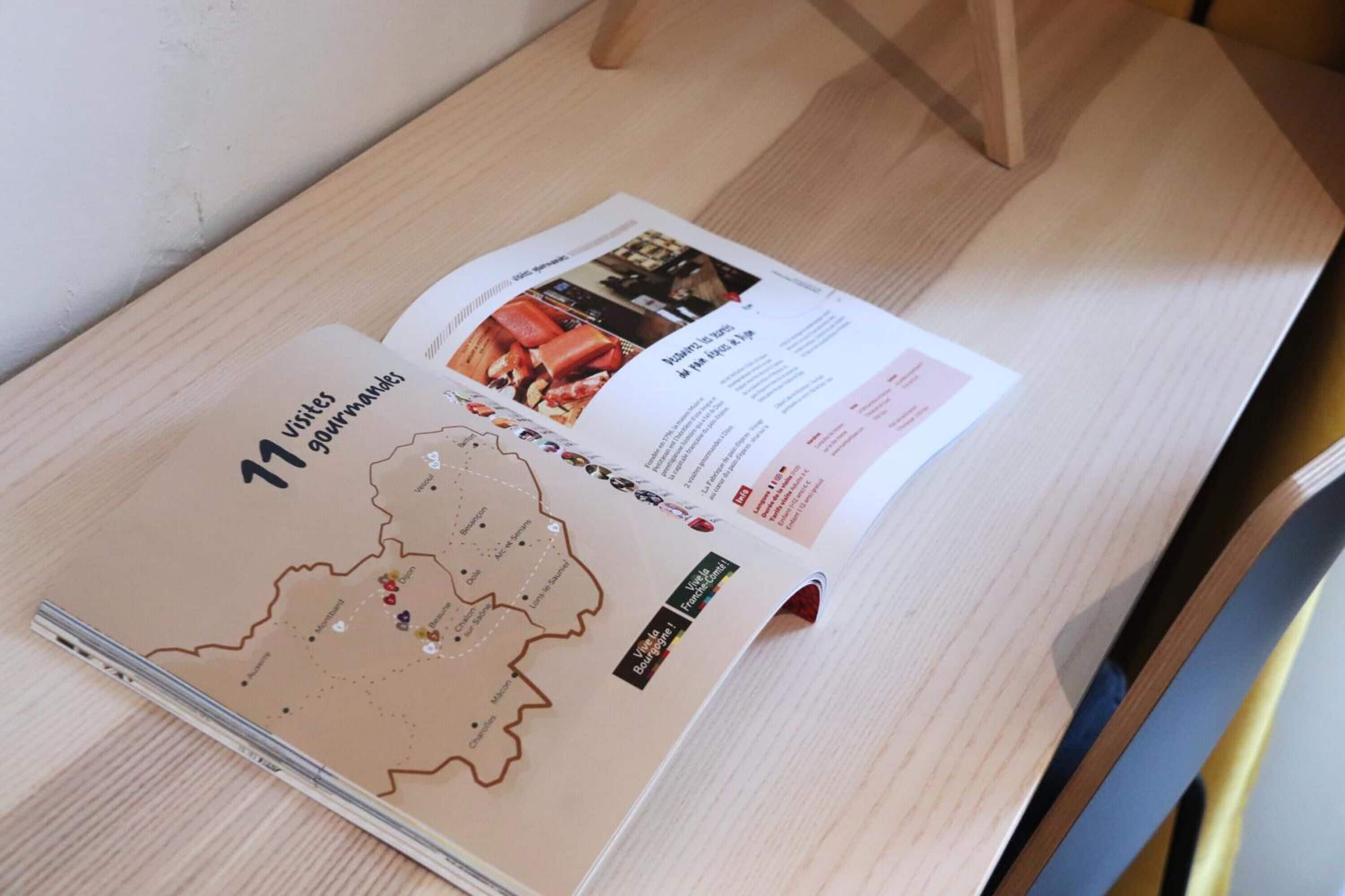 A magazine open to a page with a map and text.
