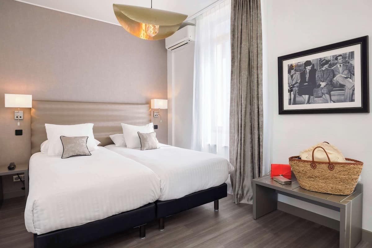Deluxe Room, Multiple Beds, Non Smoking | In-room safe, soundproofing, free WiFi, bed sheets