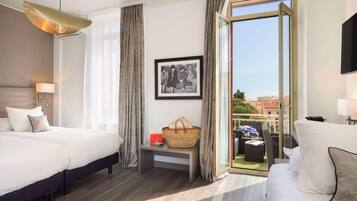 Deluxe Room, Multiple Beds, Non Smoking | In-room safe, soundproofing, free WiFi, bed sheets