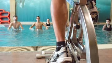 Enjoy a refreshing swim and stay active with a stationary bike near the pool.
