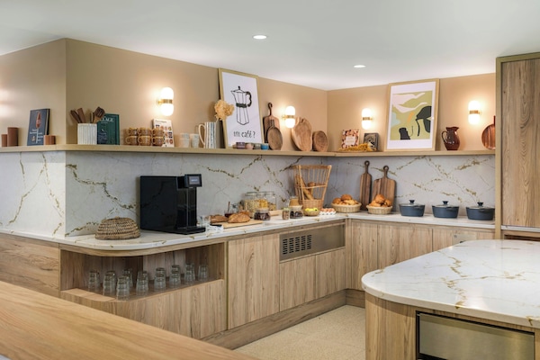 Daily buffet breakfast (EUR 14 per person)