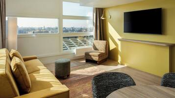 Apartment, 1 Bedroom, City View | Living area | Flat-screen TV