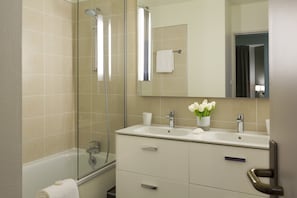 Combined shower/tub, hair dryer, towels, soap
