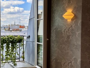 Suite, 1 Queen Bed, City View | Premium bedding, minibar, in-room safe, individually decorated