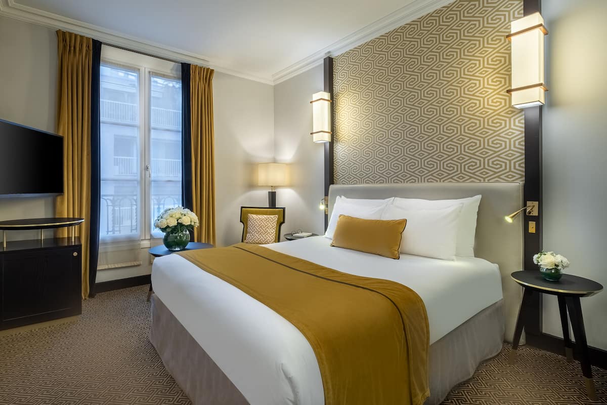 Habitación doble clásica | Ropa de cama de alta calidad y minibar