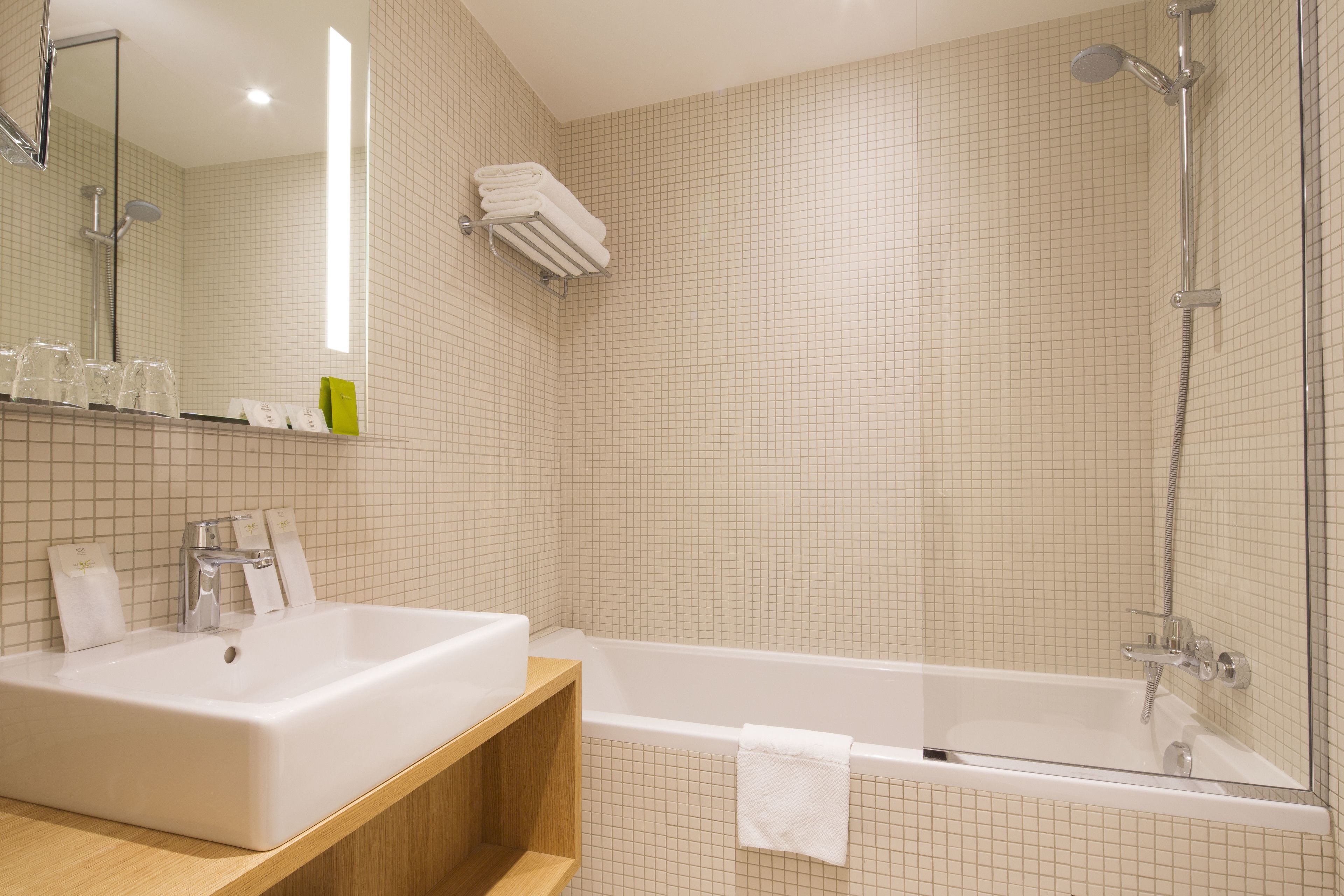 deluxe double room | bathroom | free toiletries, hair dryer, towels