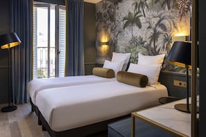 Premium bedding, in-room safe, soundproofing, iron/ironing board