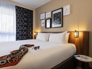 Premium bedding, pillowtop beds, free minibar, in-room safe - Mercure Paris Montparnasse Pasteur (Paris)
