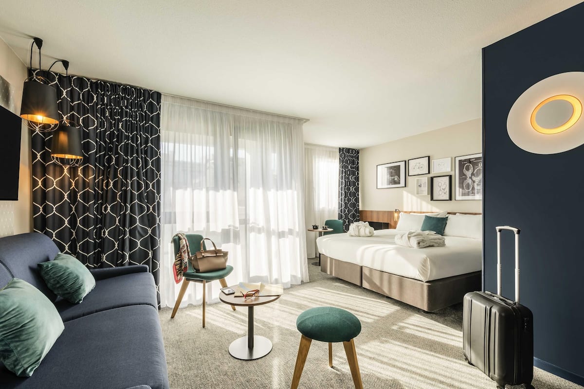 Premium bedding, pillow-top beds, free minibar, in-room safe