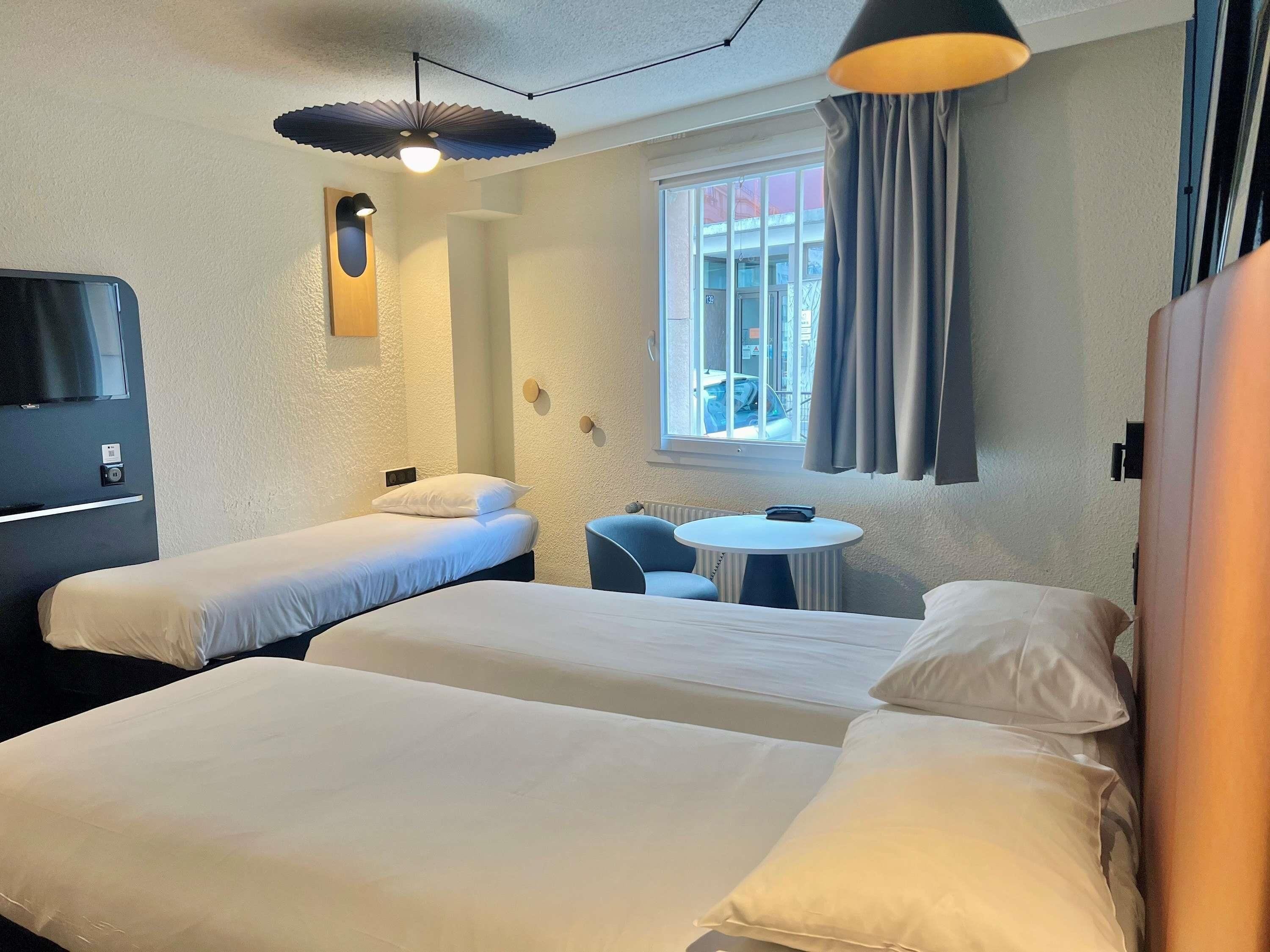 triple room, 1 double bed with sofa bed | in-room safe, desk, soundproofing, iron/ironing board