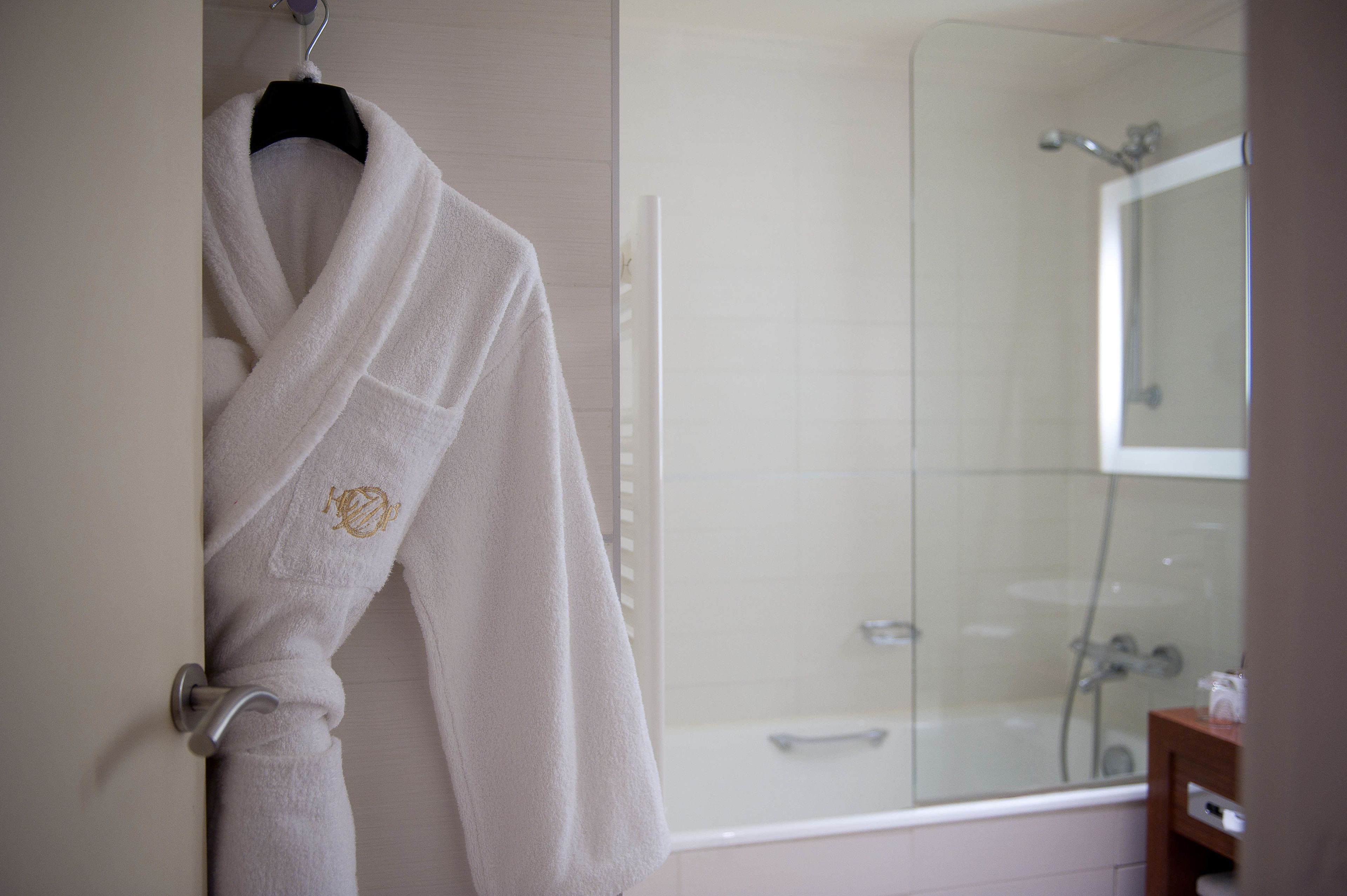 superior double room, 1 double bed, bathtub | bathroom | designer toiletries, hair dryer, slippers, towels