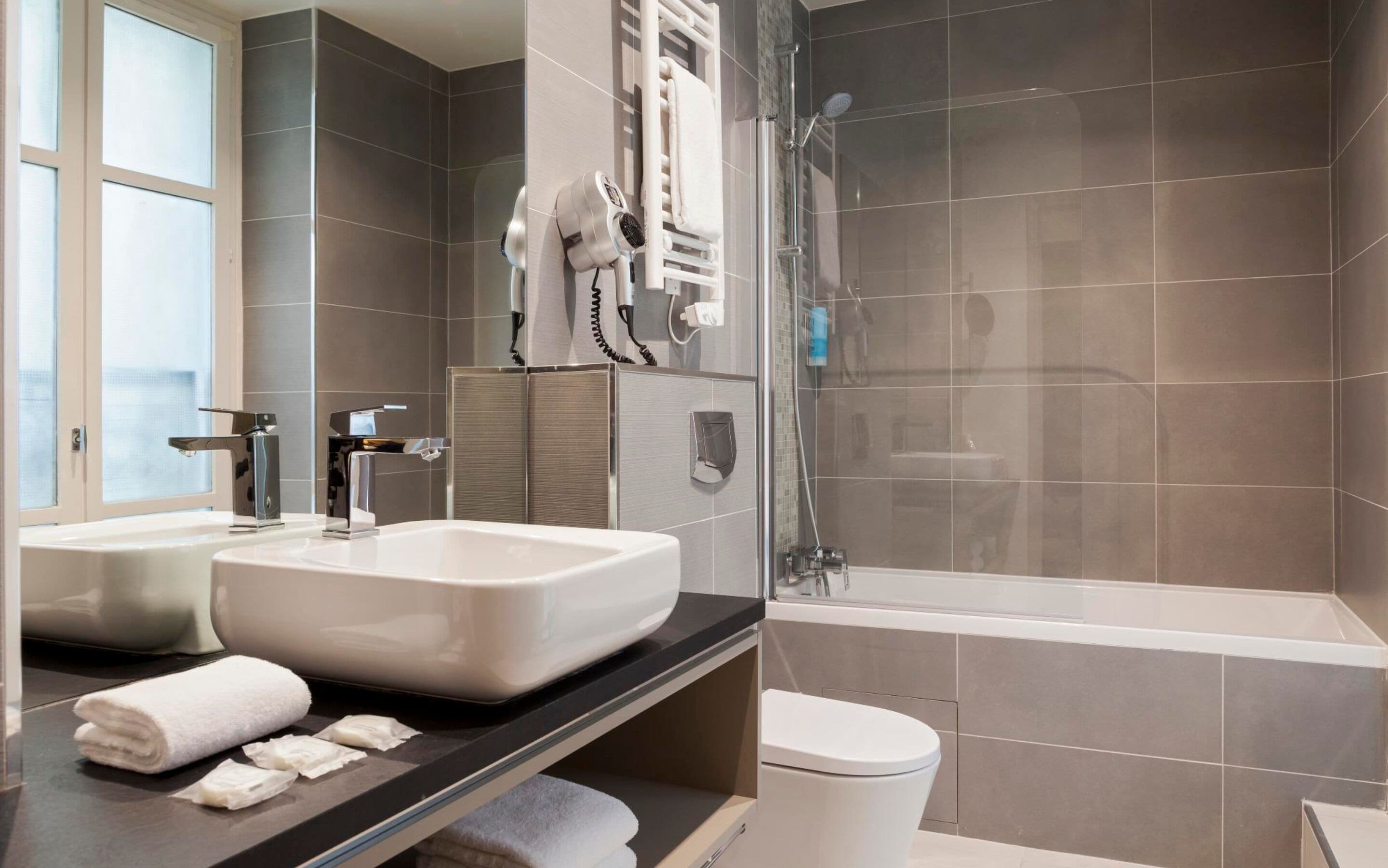 shower, free toiletries, hair dryer, towels