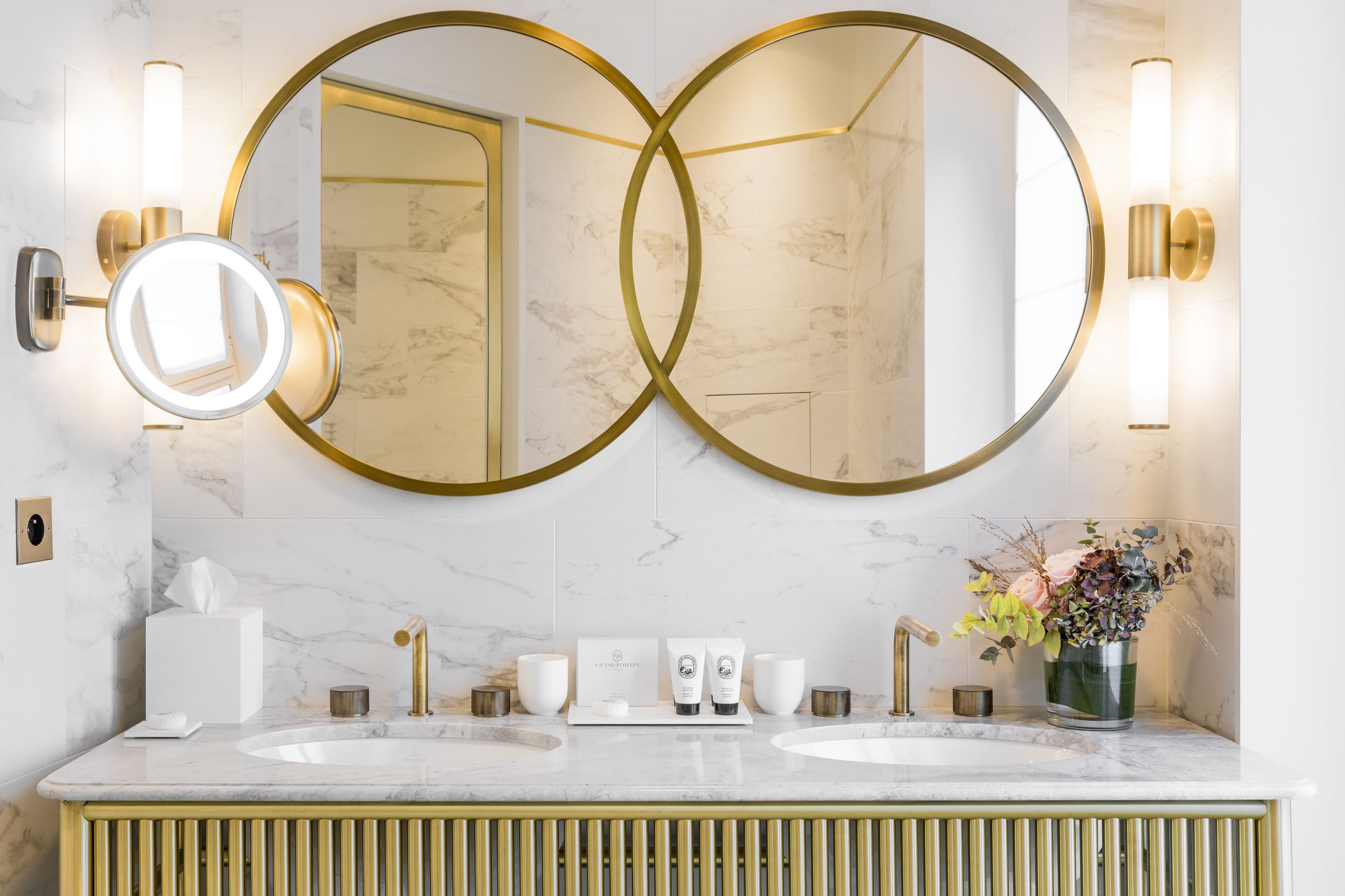 designer toiletries, hair dryer, bathrobes, slippers