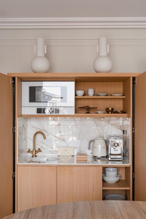 Departamento | Cocina privada | Frigobar, cafetera de espresso, cafetera y tetera y tetera eléctrica 