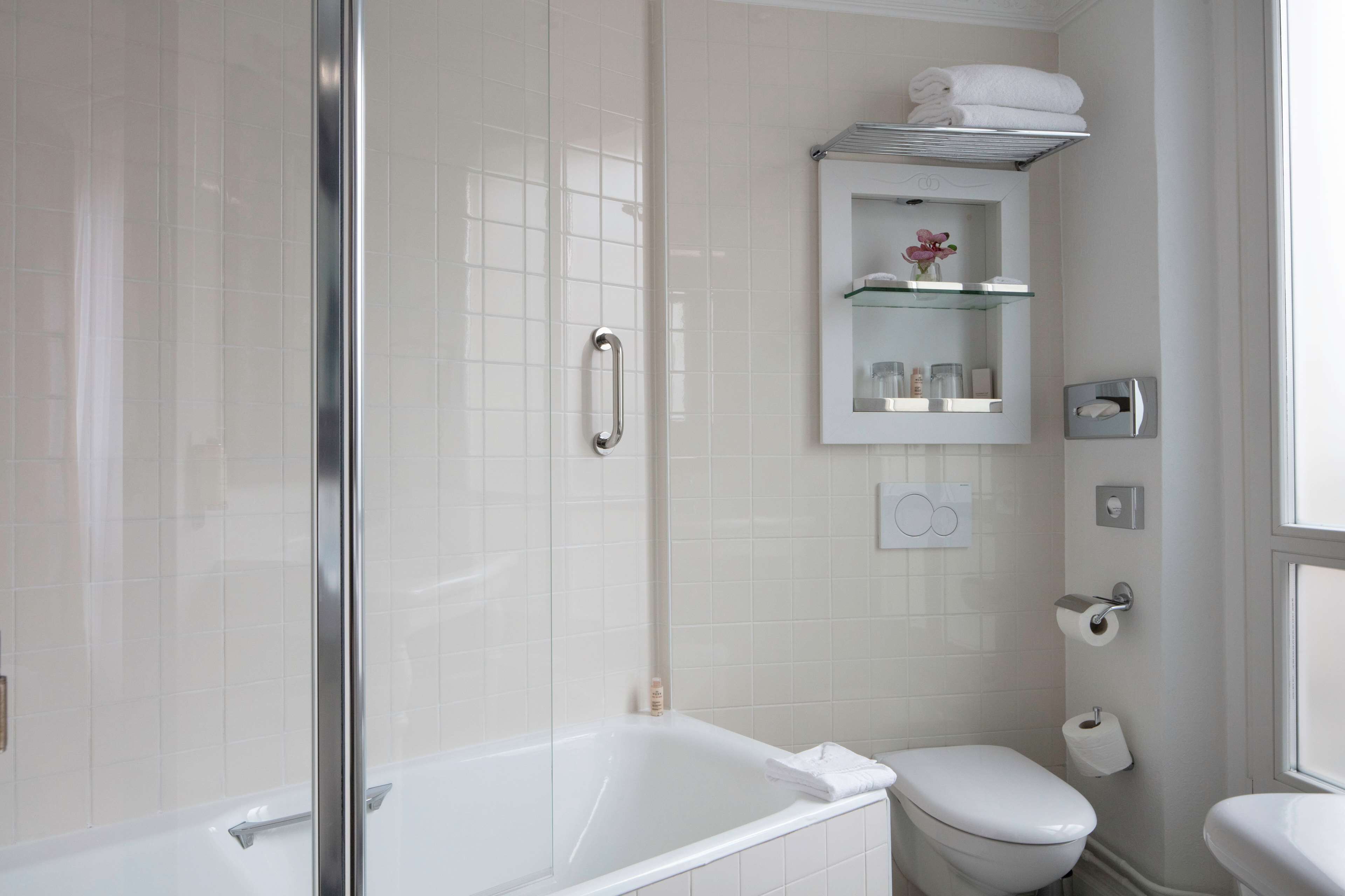 standard double room - complimentary soft minibar, courtesy tray, chromecast - snacks, digital press | bathroom | free toiletries, hair dryer, bathrobes, slippers