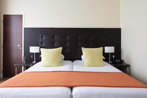 Superior Twin room - Complimentary soft minibar, courtesy tray, Chromecast - Snacks, digital press | Free minibar, in-room safe, desk, blackout drapes